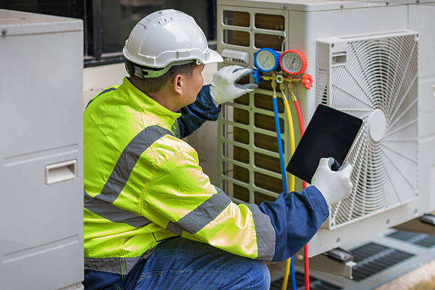 Professional Air Conditioning Repair technician working in Valencia, CA